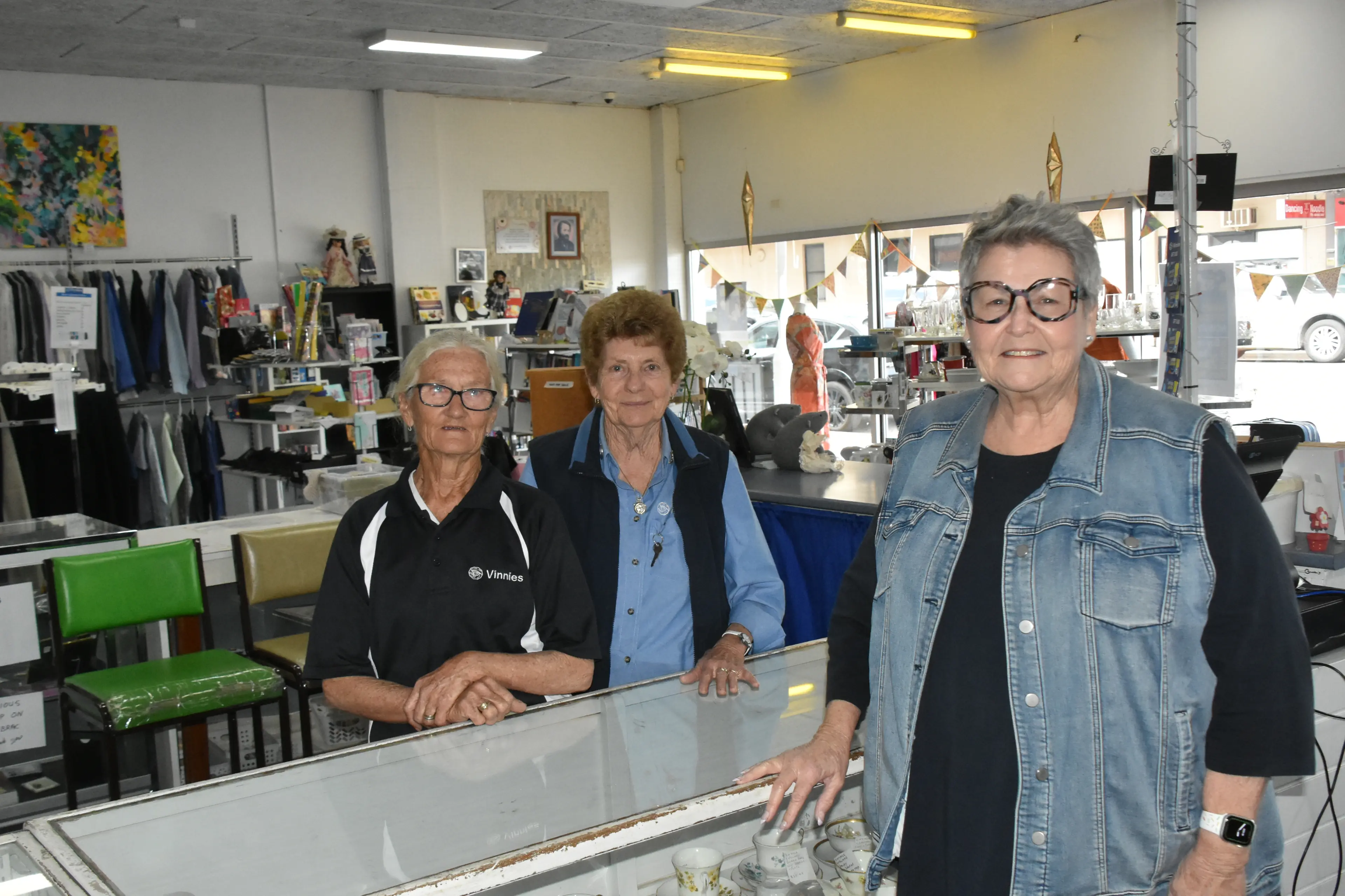 <p>Kathy Bray, Diana Morris and Rhonda Keane are helping  St Vincent de Paul Society NSW support the community.</p>\\n